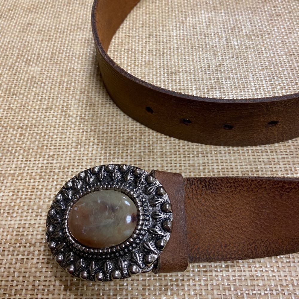 Genuine brown leather belt, size large.